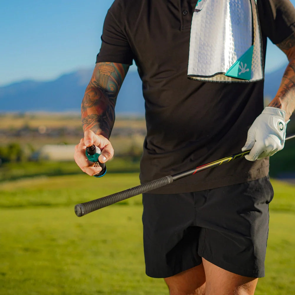 golfer cleaning golf grip